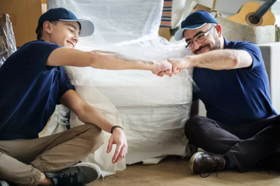 Movers doing a fistbump